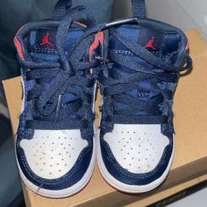 Blue, Red & White Jordan 1. Worn shoe.